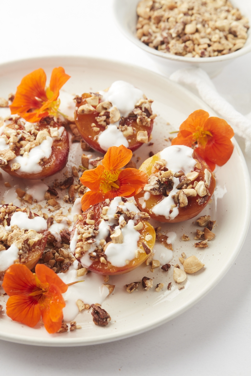 Baked nectarine with pecan-cashew crumble. From my book Goed Eten. Sugar free, gluten free, low carb.